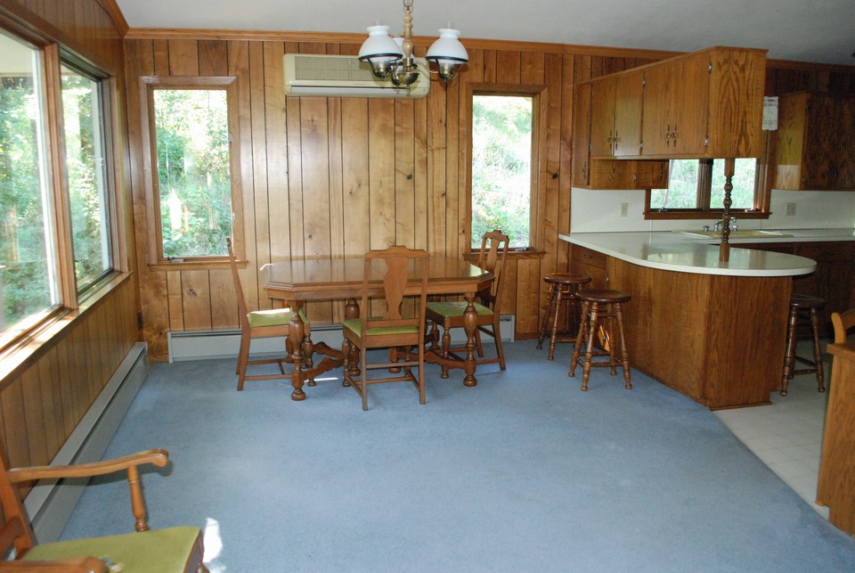 dining area open to kitchen and living room