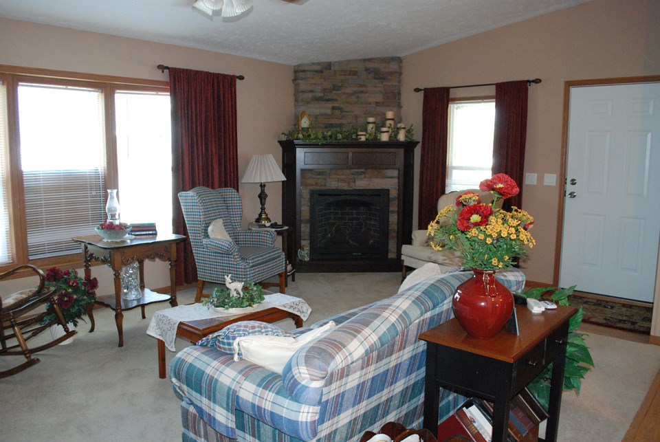 living room with kozy heat fireplace