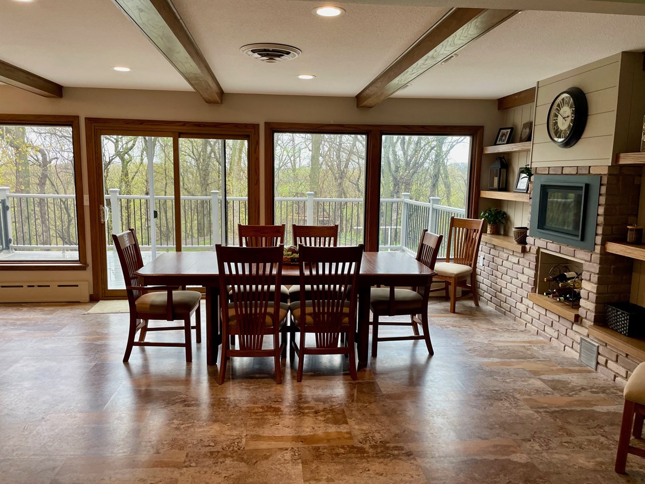 dining area with a great view of backyard and deck