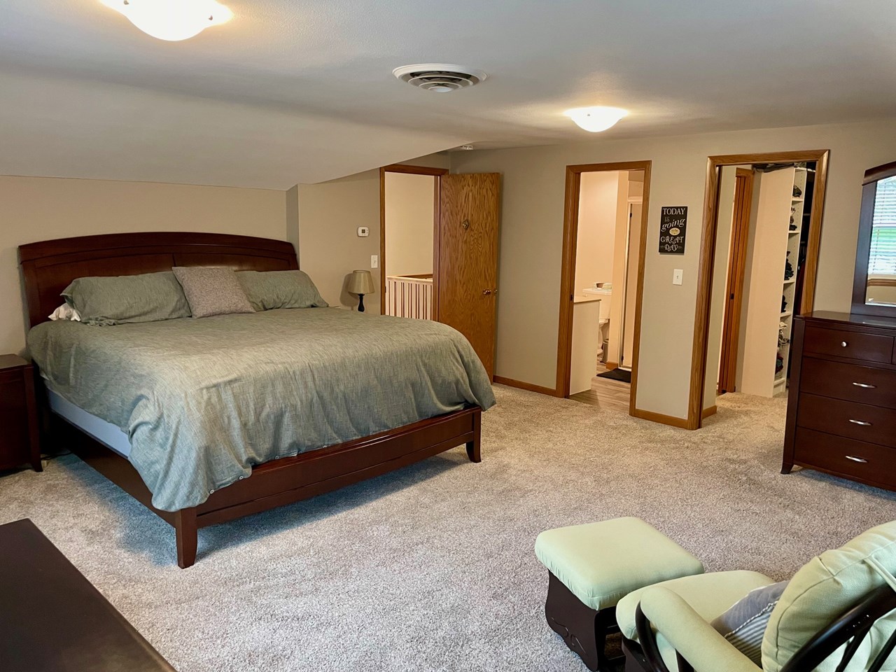 main bedroom with a walk-in closet and 3/4 bath