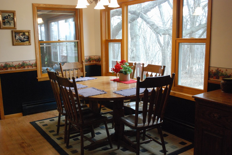 dining room w/ side view to woods