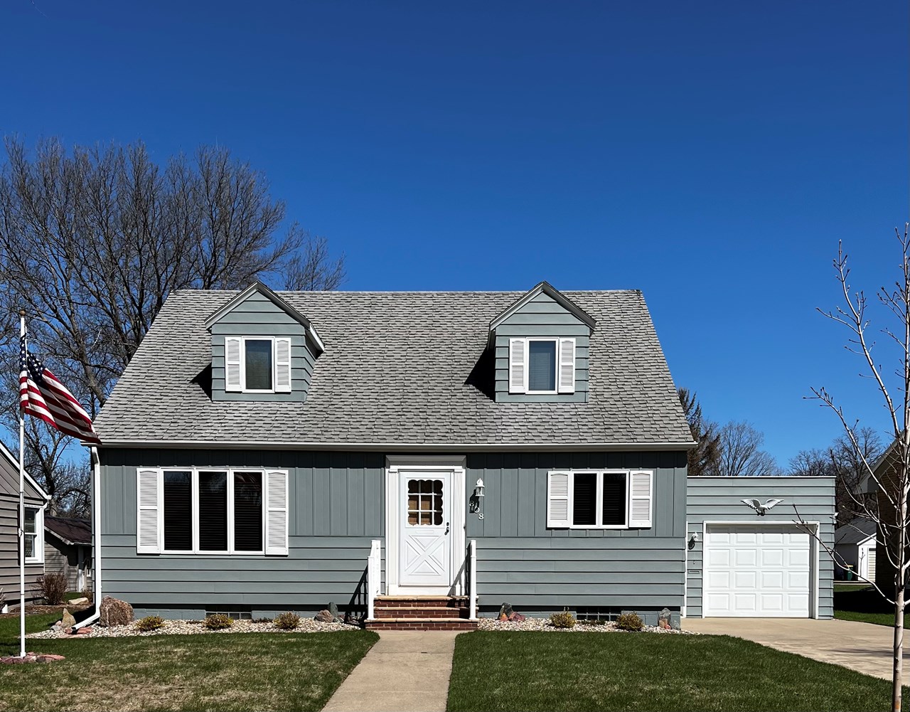 well maintained cape code style home with a detached garage w/ office...great location!