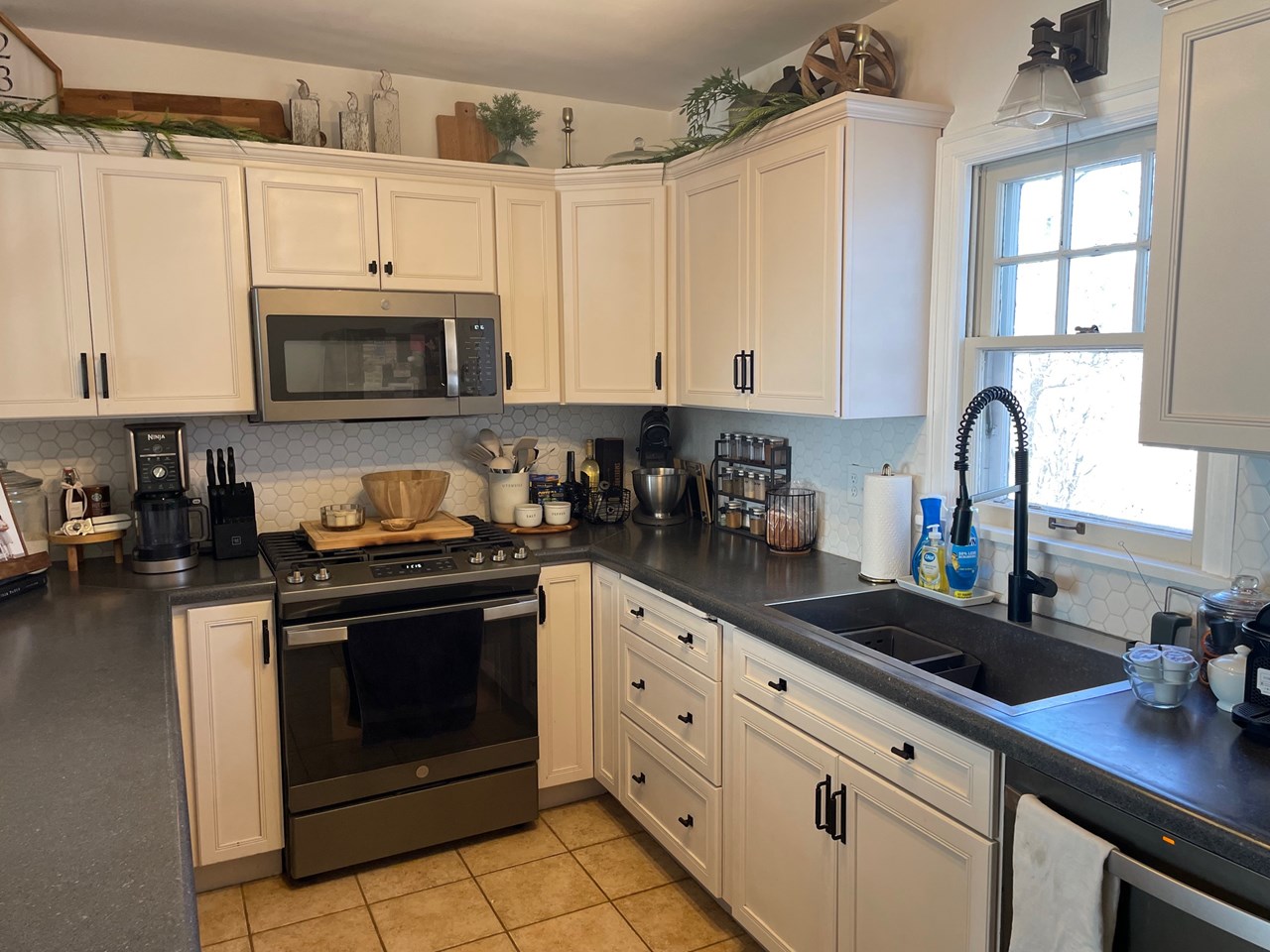 updated kitchen open to dining area and living room