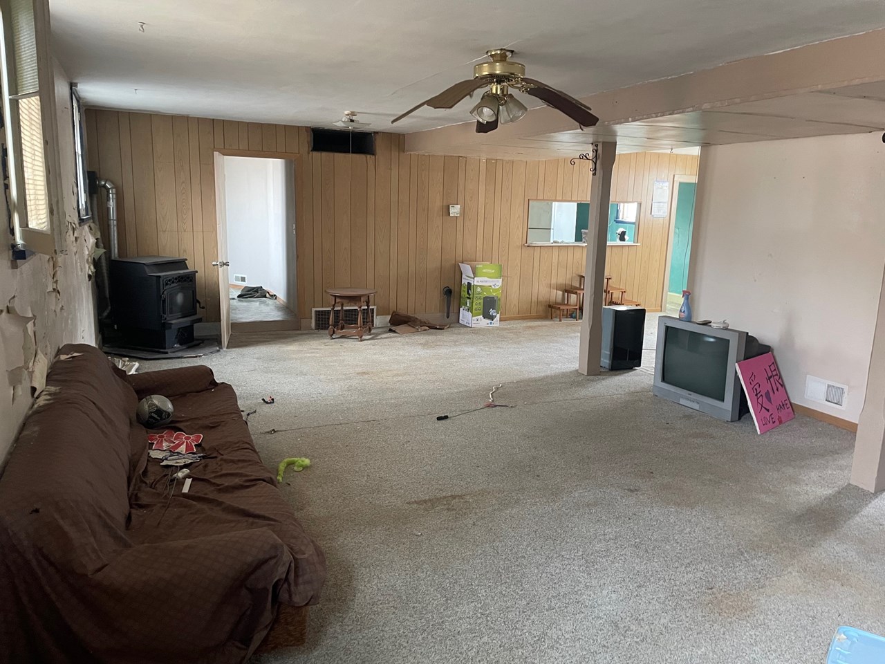 living room looking to kitchen and bath