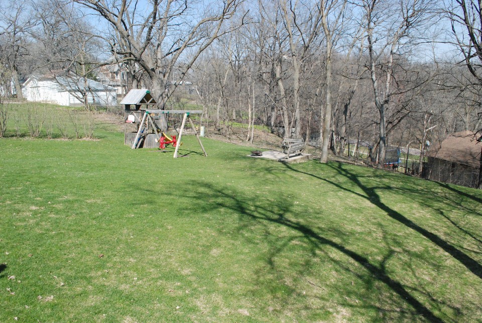 backyard play area and firepit