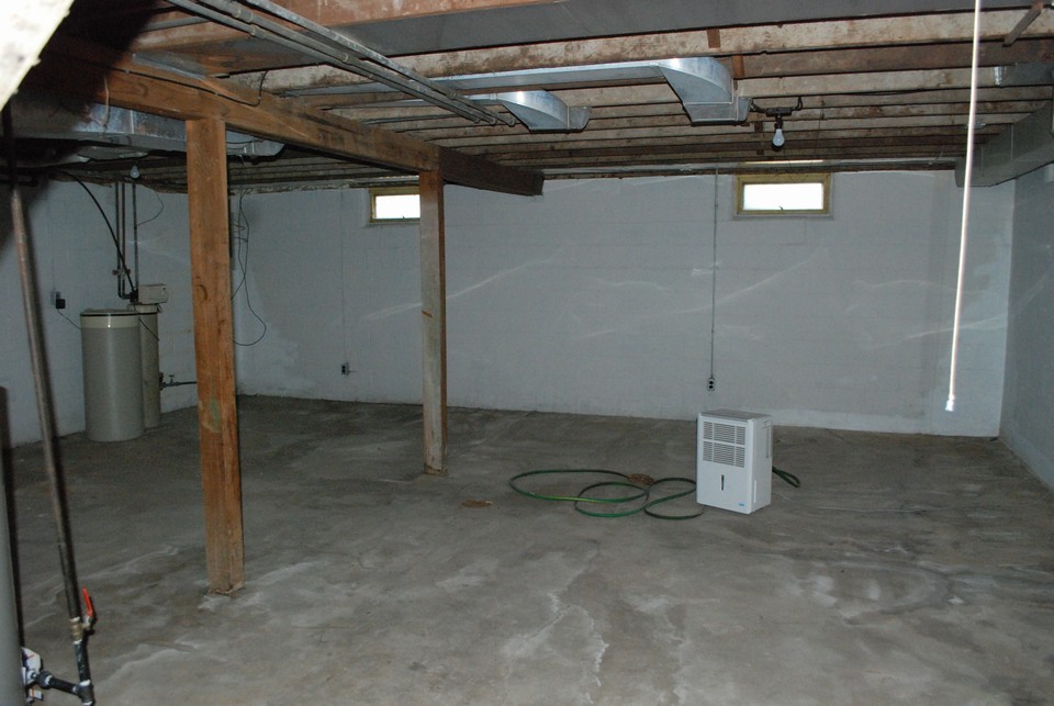 unfinished basement with laundry