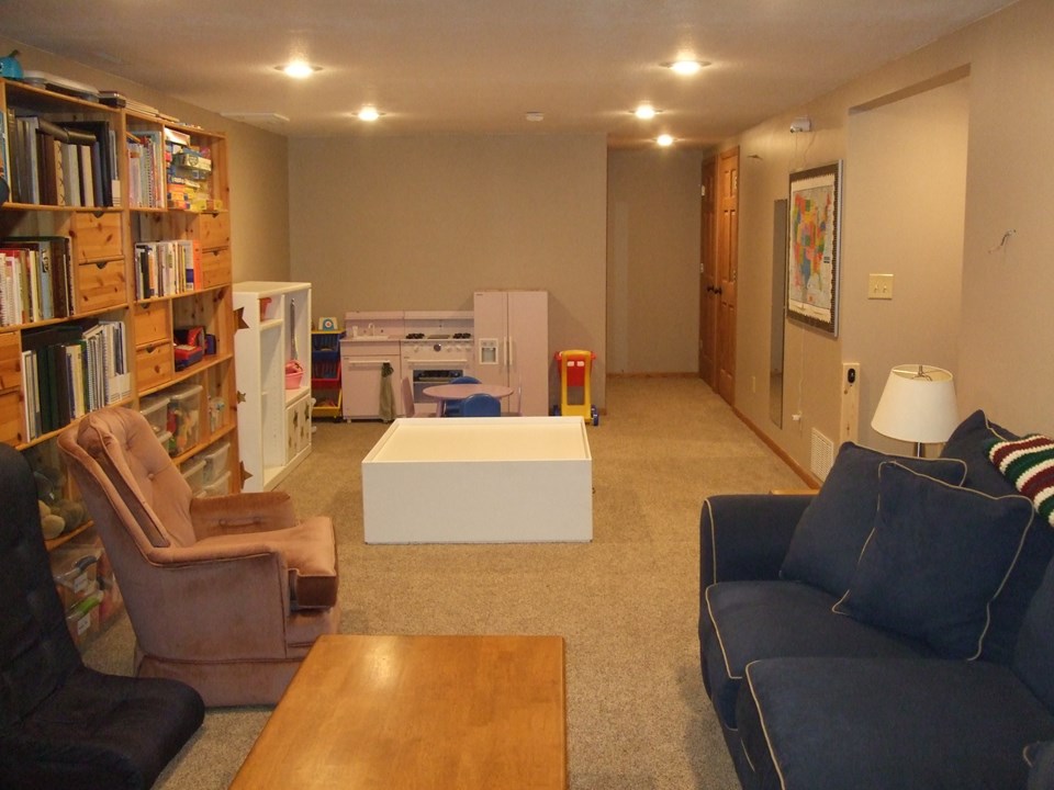 family room lower level with kozy heat