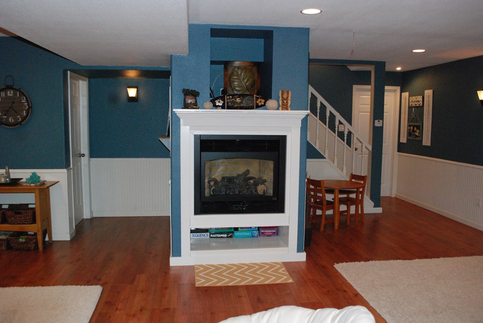 lower level family room w/ kozy heat gas fireplace