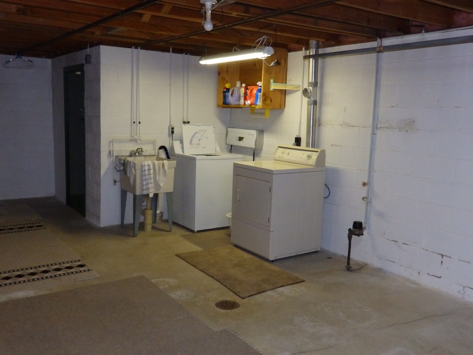 open unfinished laundry/utility area
