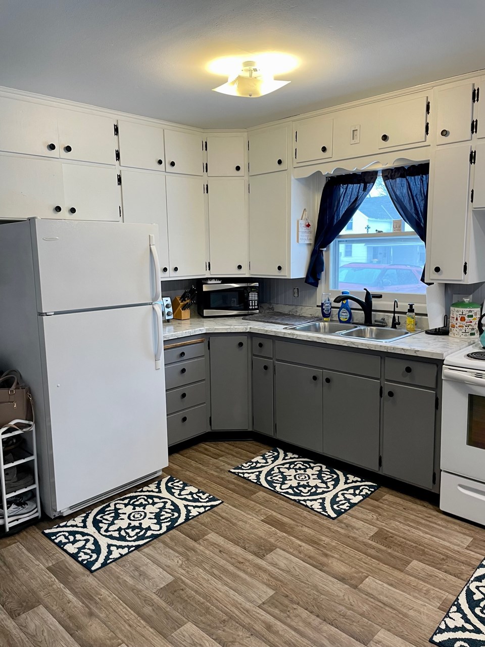 newer countertop and flooring