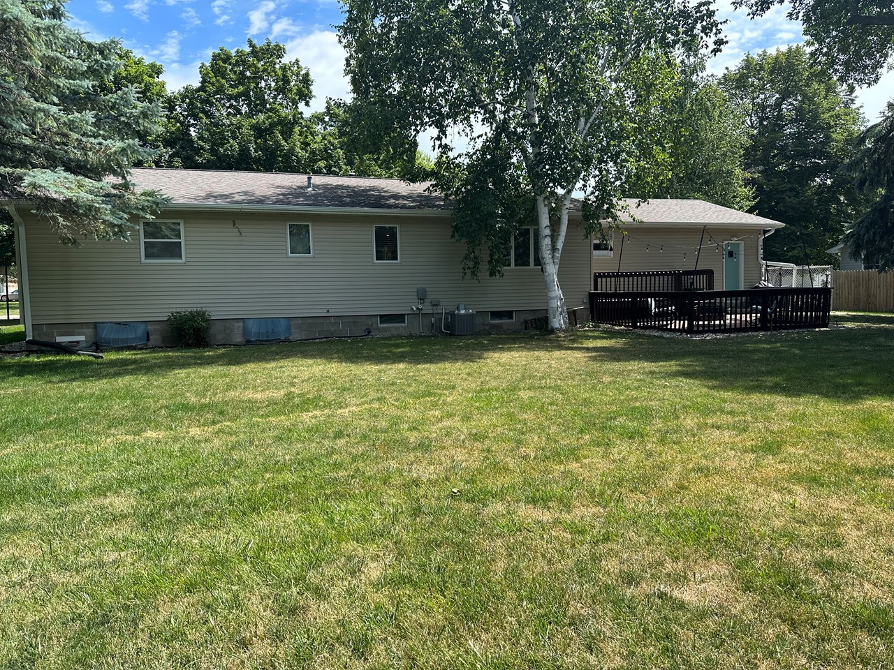 spacious backyard with deck/patio