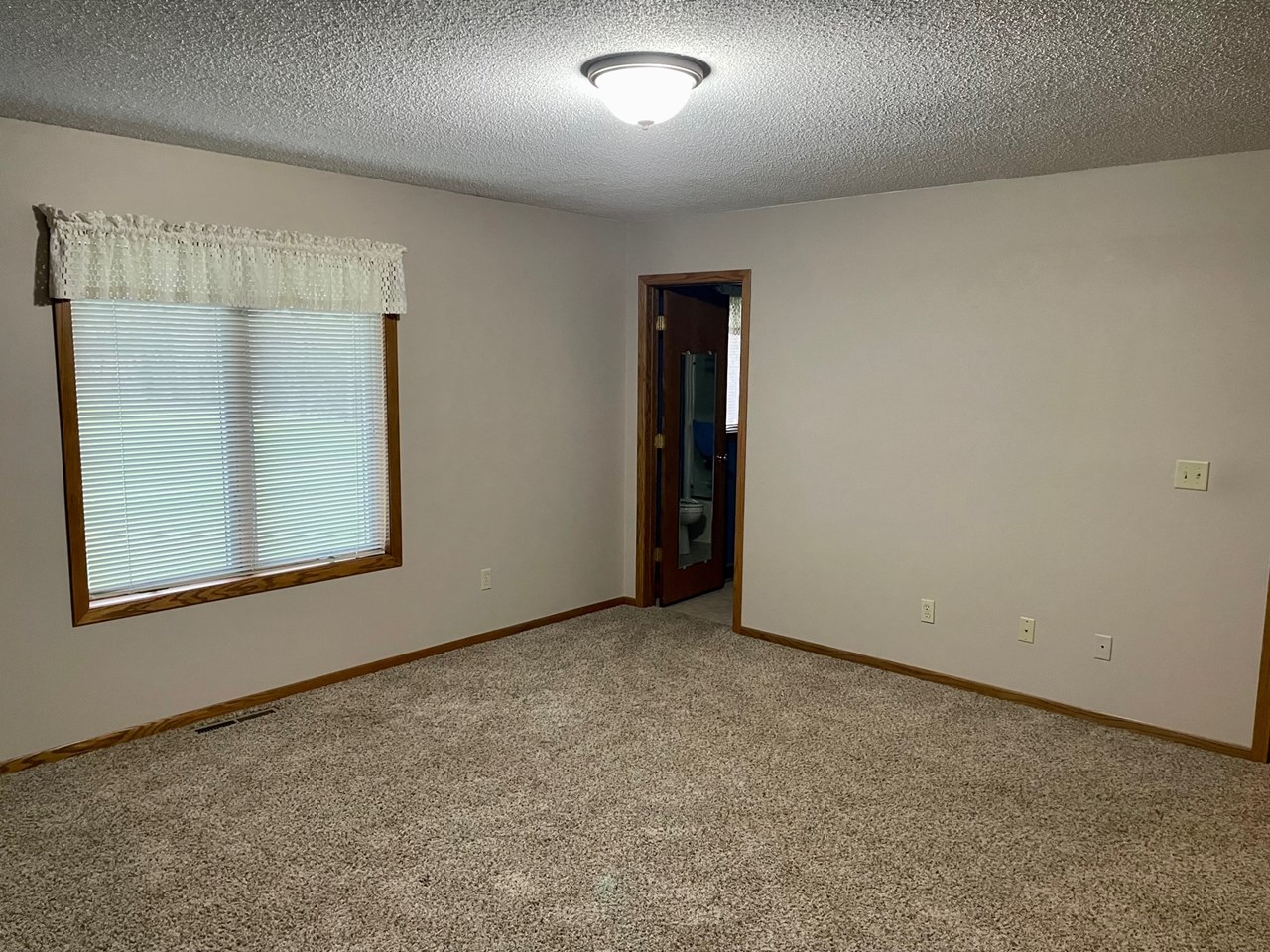 main bedroom with a full bath