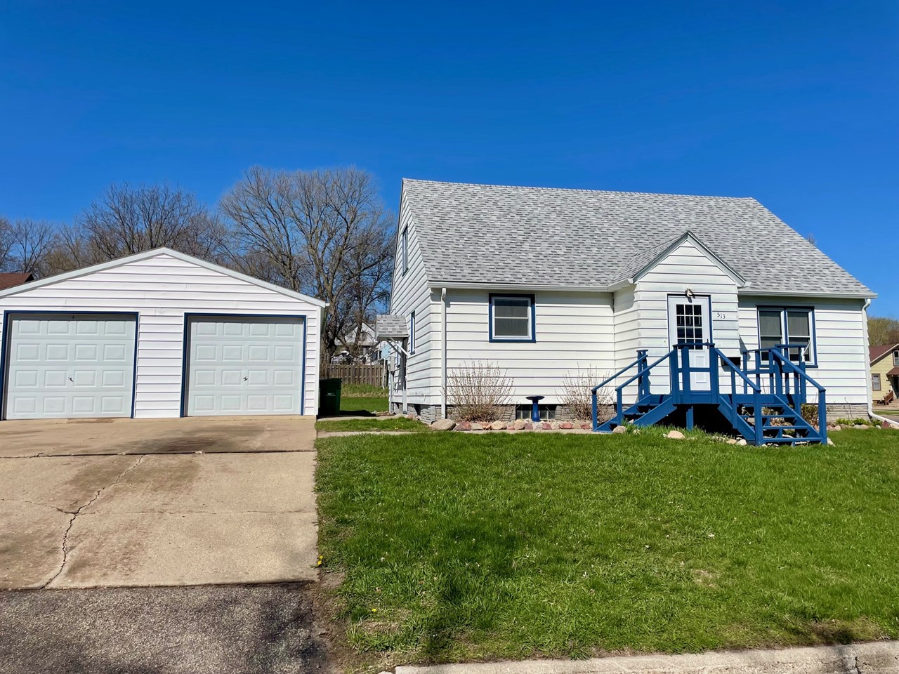 three bedroom home with a double car garage on large corner lot.
