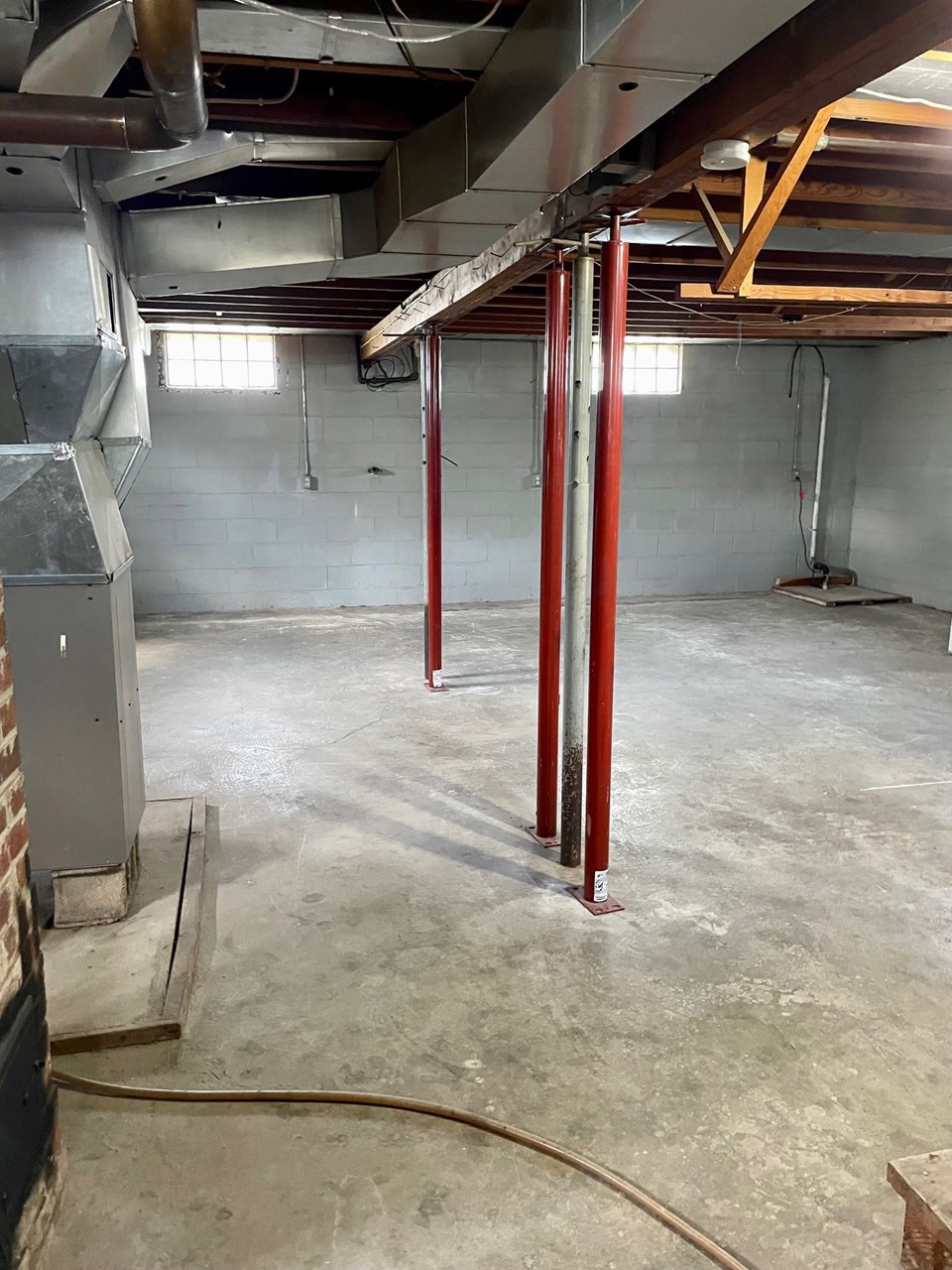unfinished basement that has lots of potential