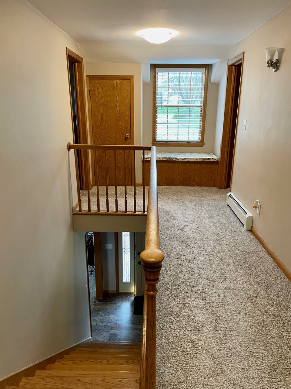 great sitting bench and open stairway