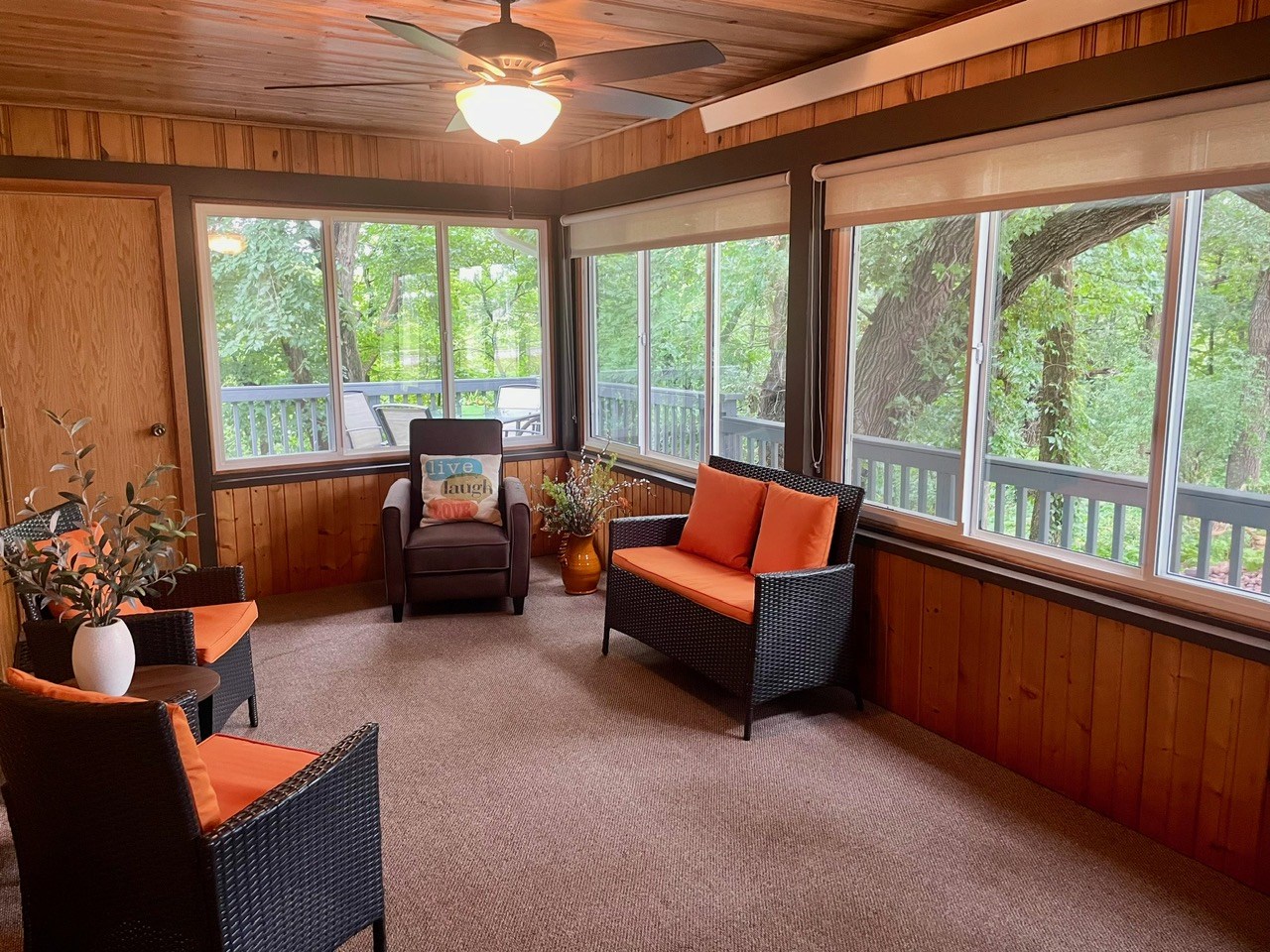 four season sun room with access to deck
