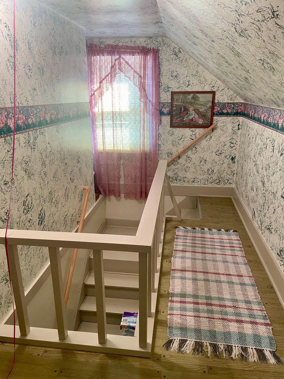 upstairs landing open to bedroom