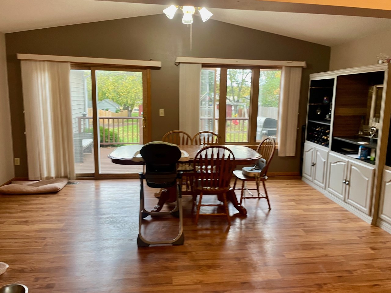 view to deck and backyard