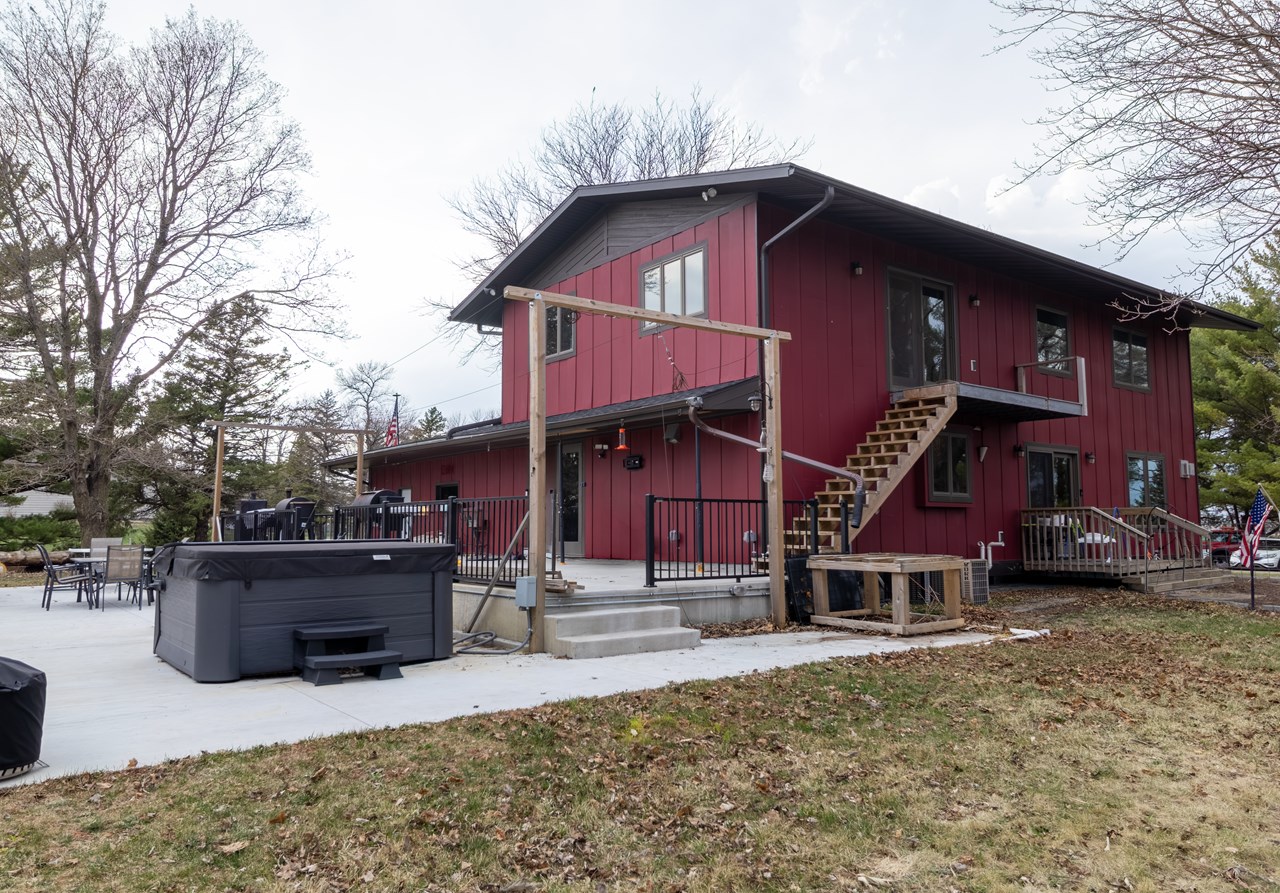 concrete patio exterior staircase to primary bedroom upstairs. railings to be installed.