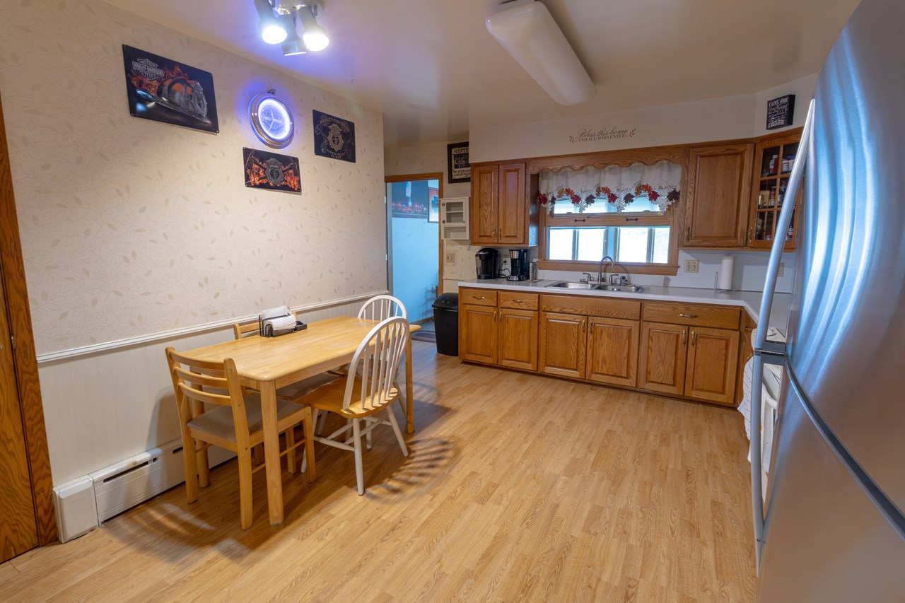 kitchen looing into three season family area