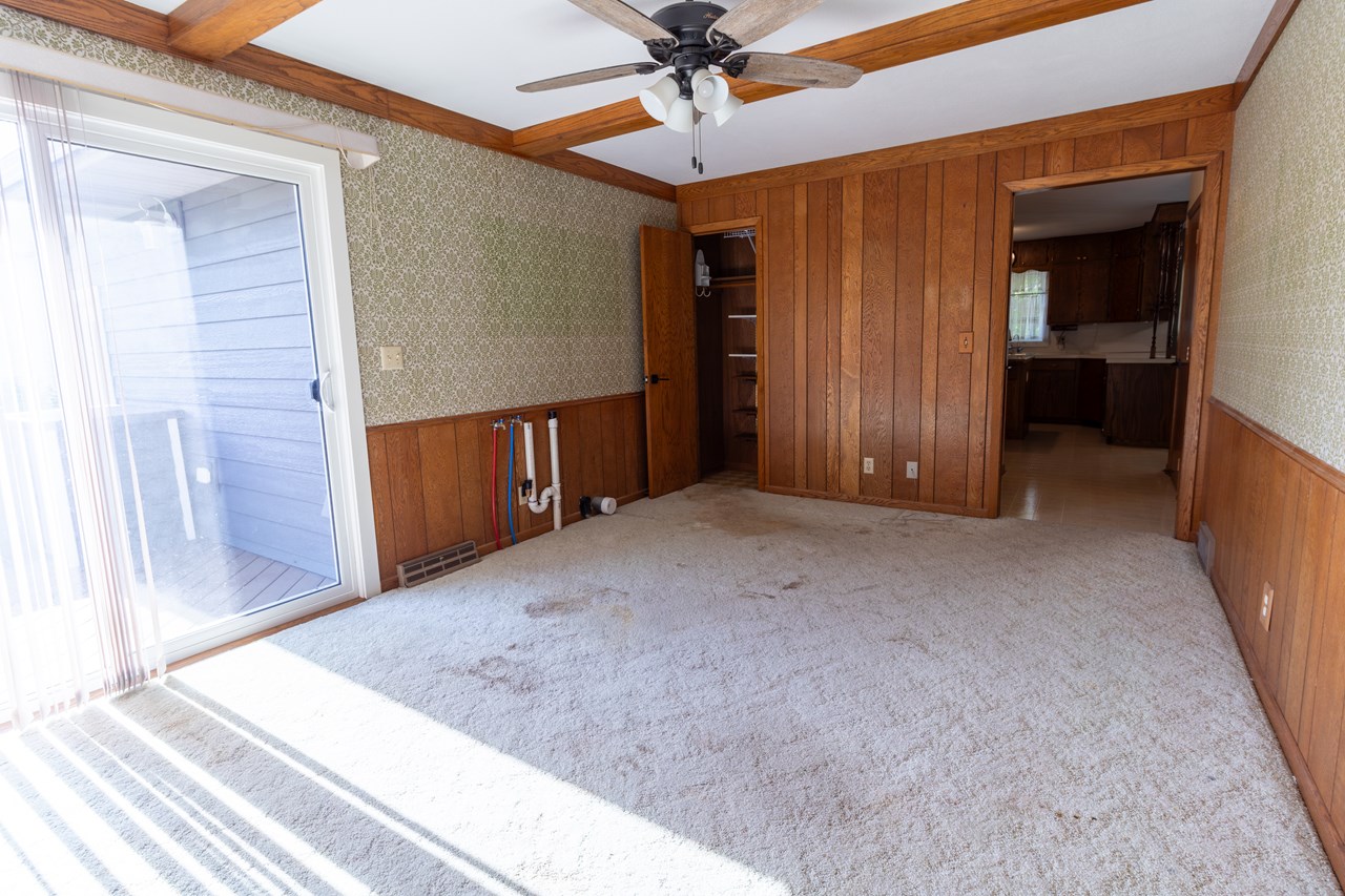 bonus room with main floor laundry and access to deck
