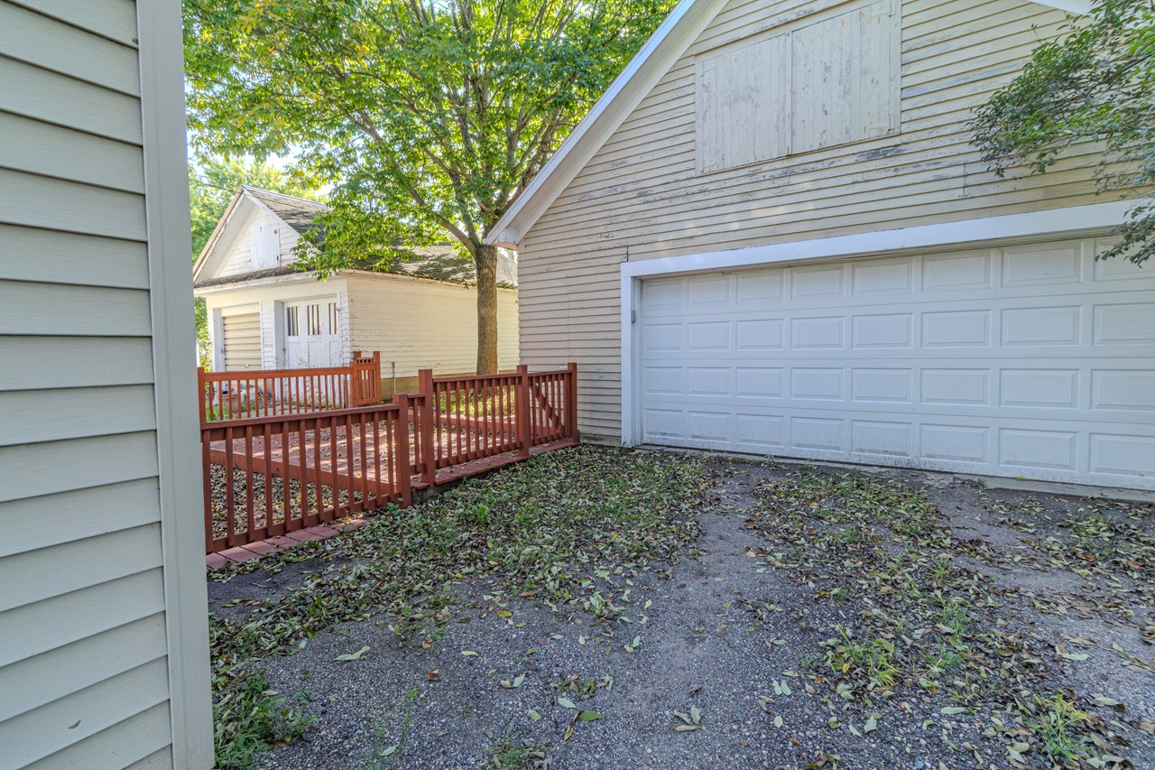 double detached garage with storage upstairs